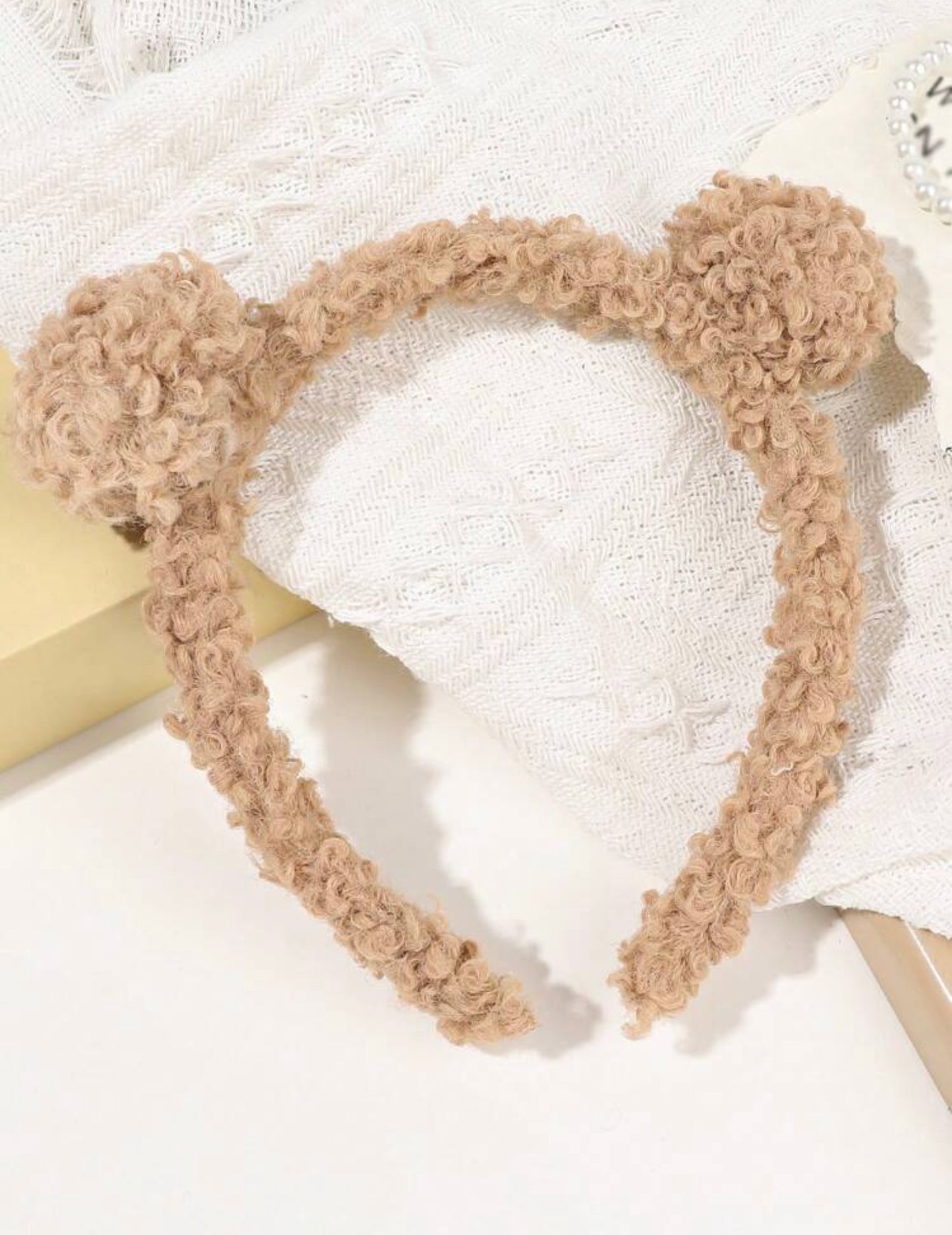 عصابة رأس من الصوف البني