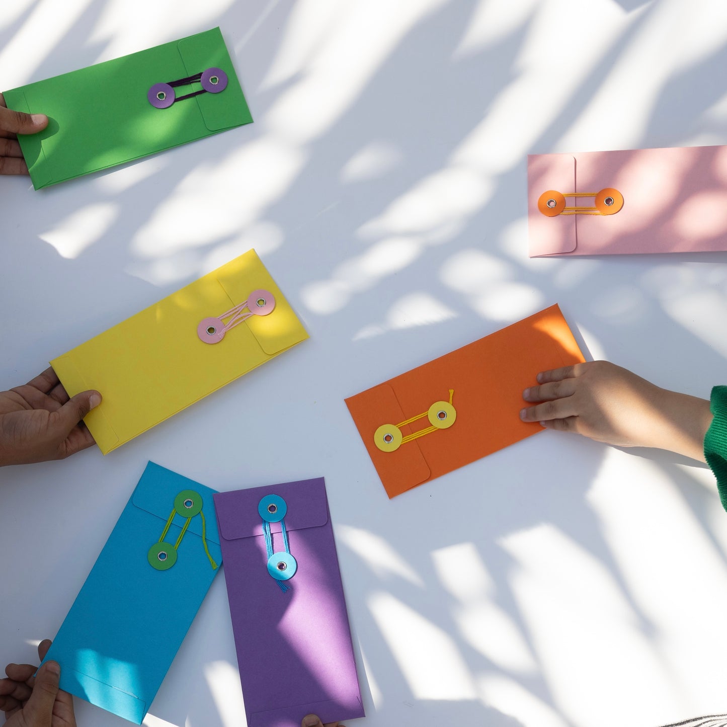 PAPER ENVELOPE WITH STRING