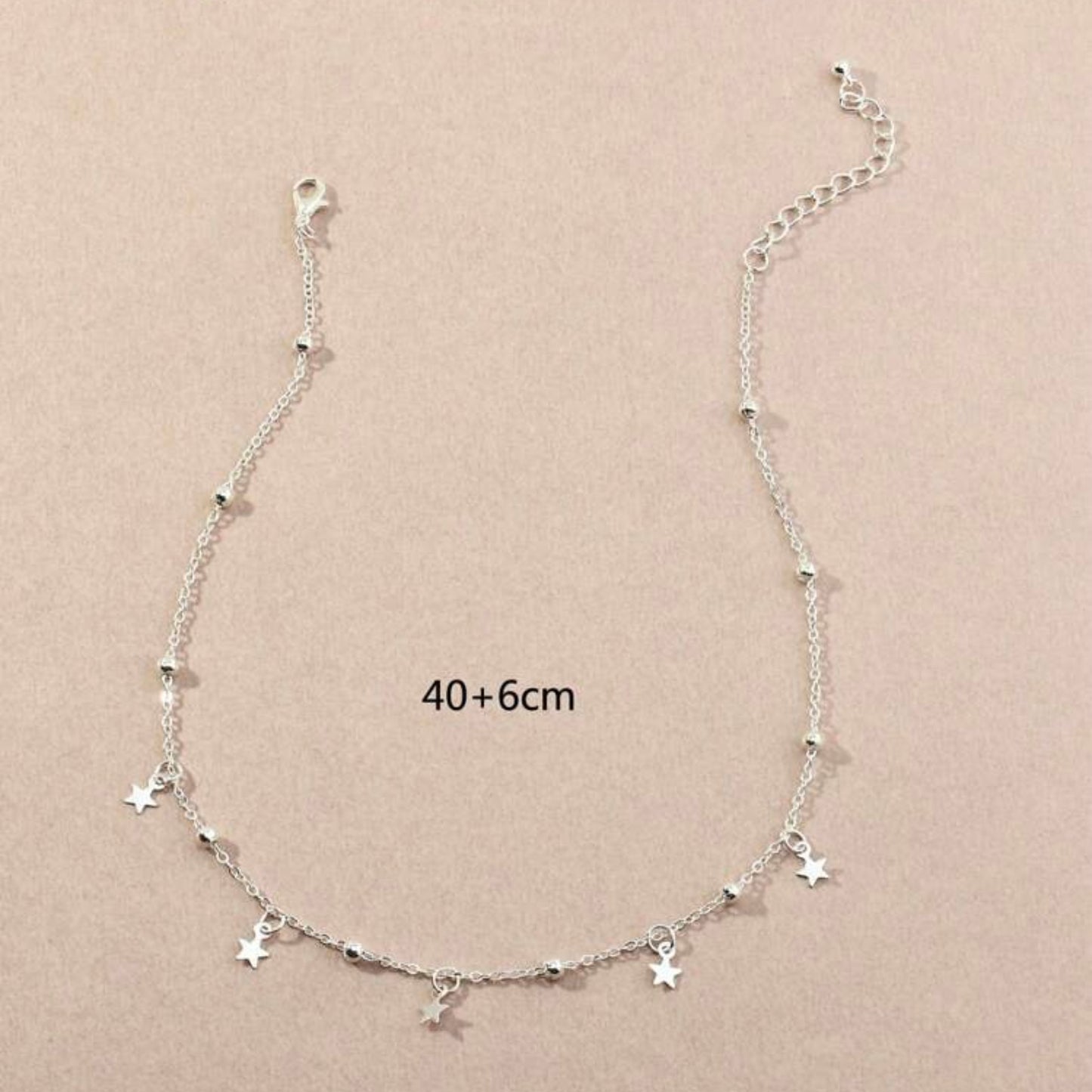 قلادة نجمة فضية