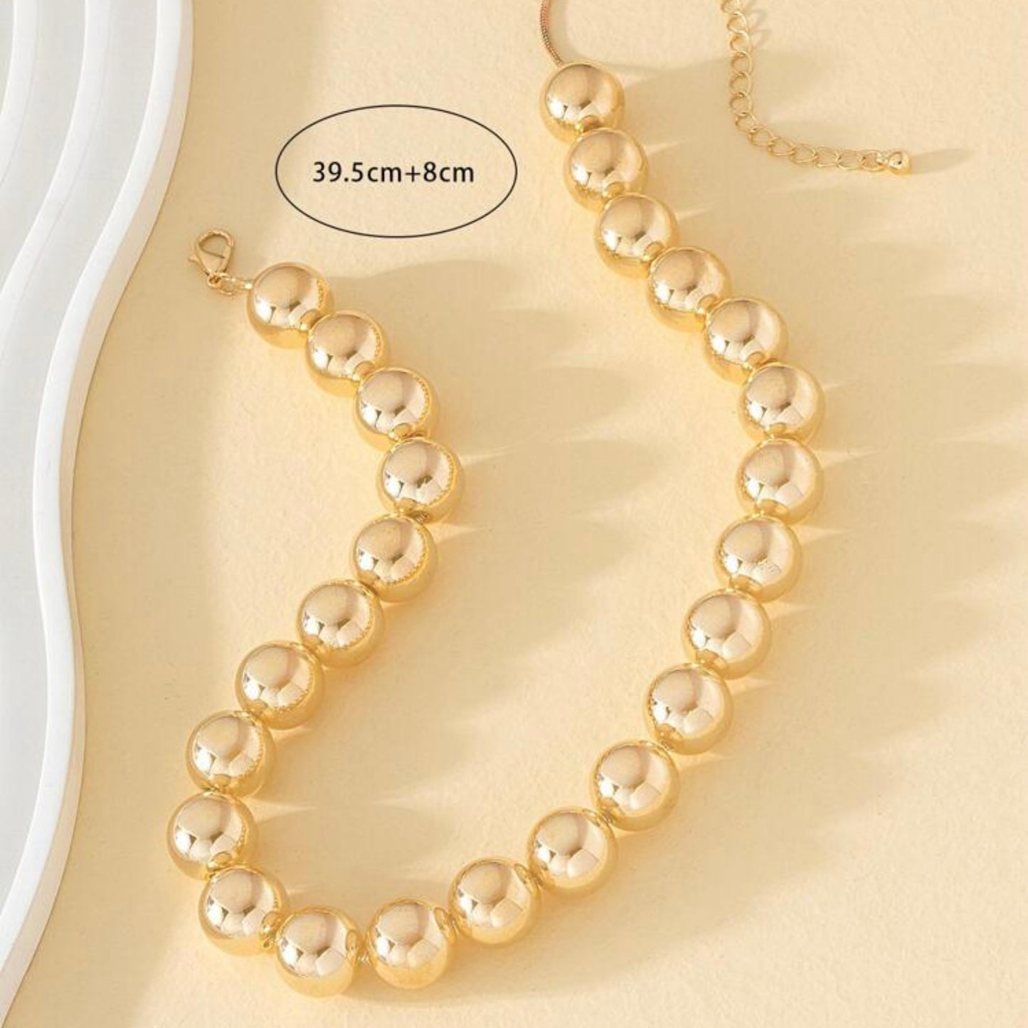Gold beaded necklace