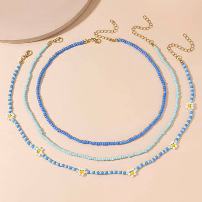 Set of blue beaded necklace