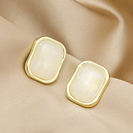 White pearl earring