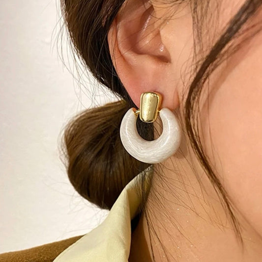 Round white earring