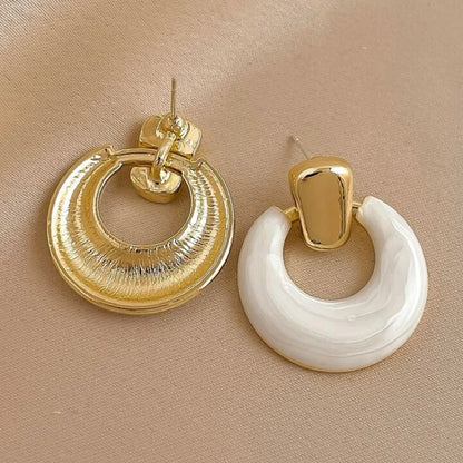 Round white earring