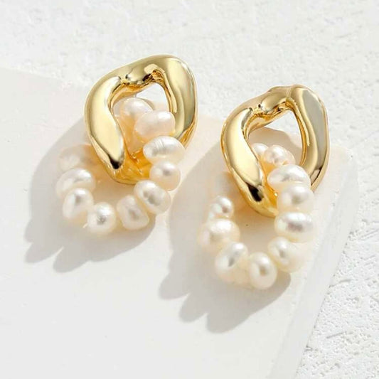 Gold pearl earring