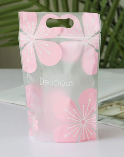 PLASTIC BAG WITH HANDLE - PINK FLOWER