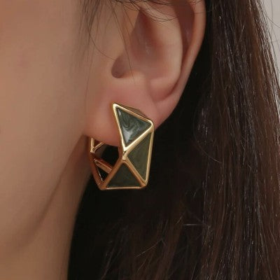Green clip earring